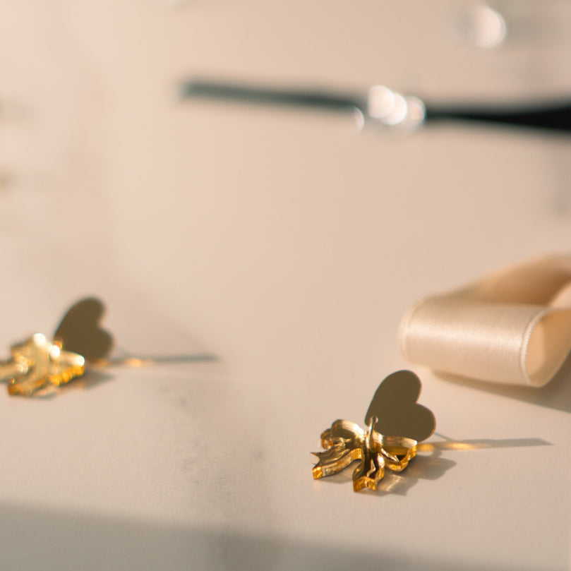 Take A Bow-tappikorvikset - Kulta