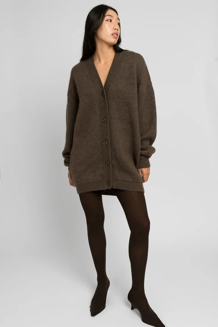 Runo - Äidin valvova silmä Ruskea