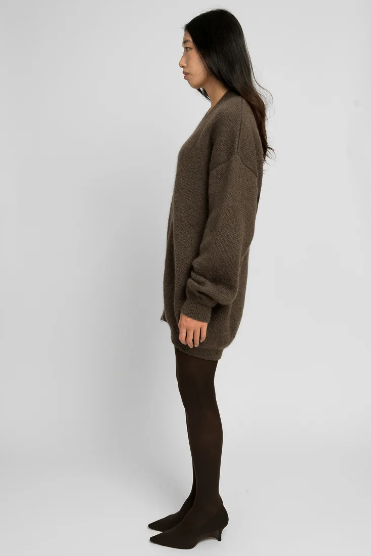 Runo - Äidin valvova silmä Ruskea