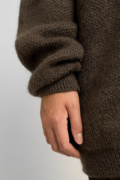 Runo - Äidin valvova silmä Ruskea