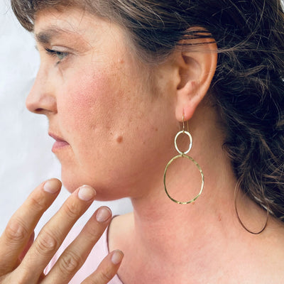 Kuplivat korvakorut - Messinki M