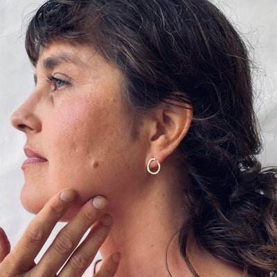 Kuplivat nappikorvakorut - Messinki