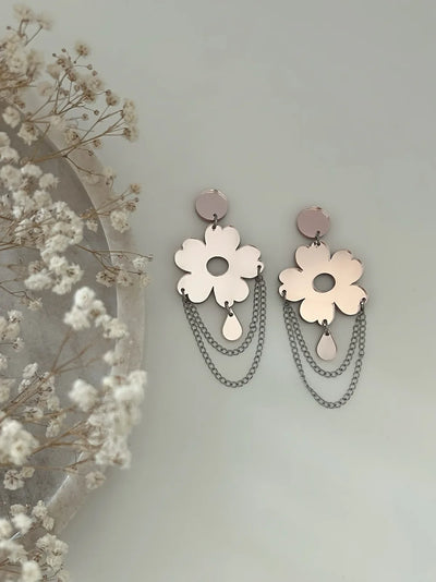 Nuppu Ketjulla - Ruusukultapeili