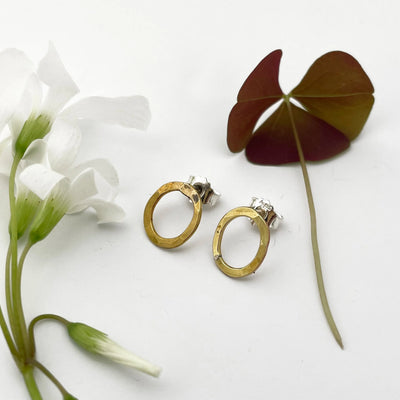 Kuplivat nappikorvakorut - Messinki